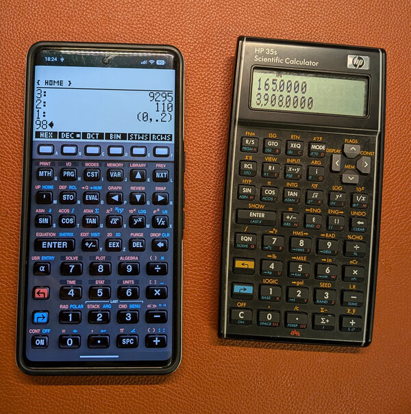 Free 48sx on Android next to an HP 35s scientific calculator